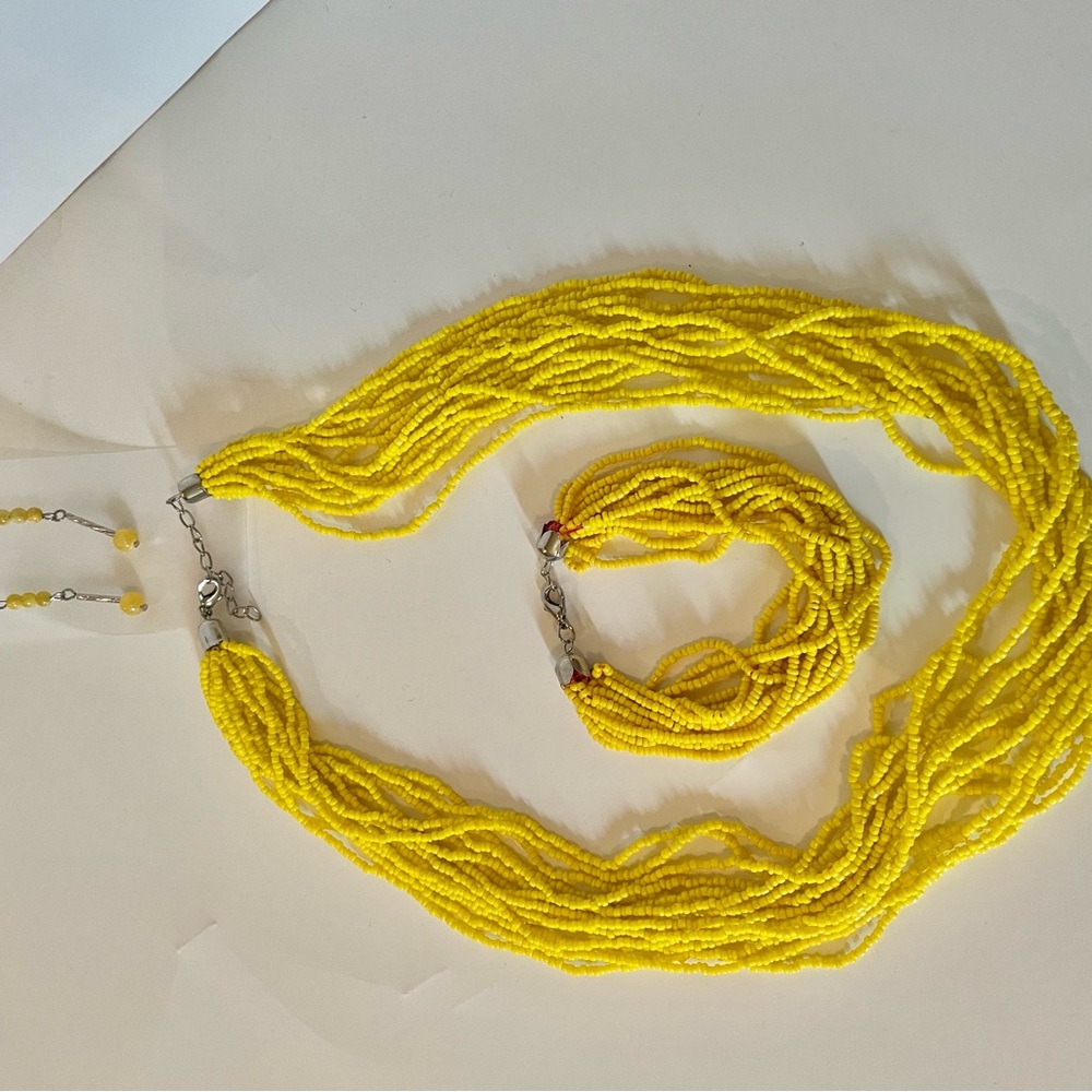 3/$20.  NEW Yellow Beaded Necklace and Bracelet Earrings Set